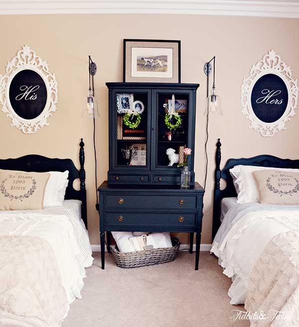 Fun guest bedroom - love the his and hers signs over the twin beds kellyelko.com