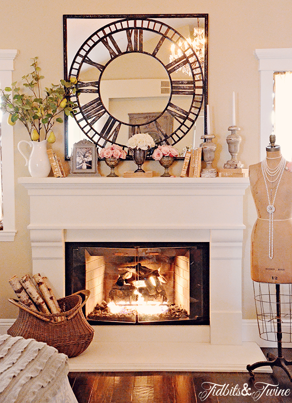 I love this fireplace mantel and that fun mirror clock eclecticlalyvintage.com