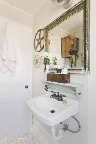 Tiny white vintage bathroom with charm kellyelko.com