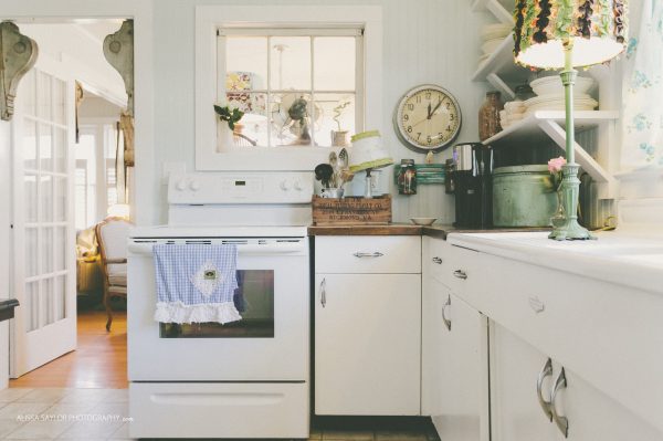 Vintage kitchen with lots of charming details like the double drainboard sink kellyelko.com