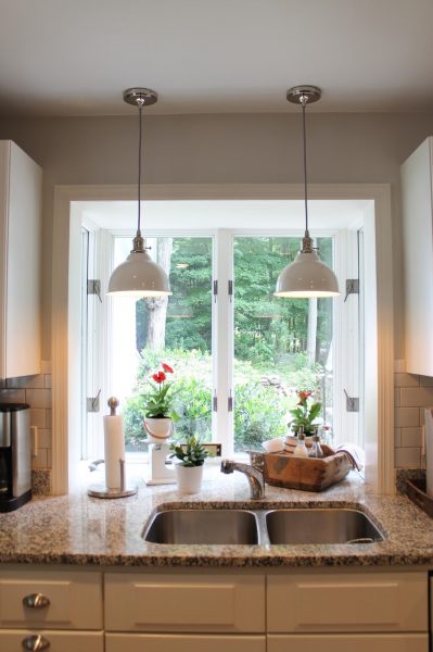 Love the enamel double pendant lights over the kitchen sink kellyelko.com