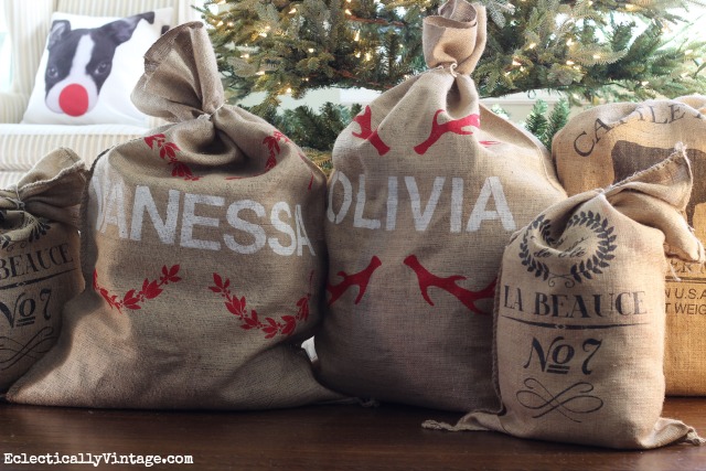 Make these adorable DIY Personalized Grain Sacks - such cute little Santa Sacks under the tree! kellyelko.com