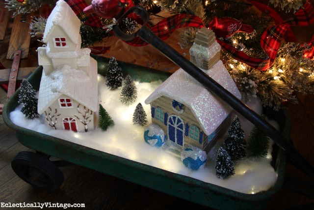 Make a DIY lighted Christmas snow village - love it in the old wagon! kellyelko.com