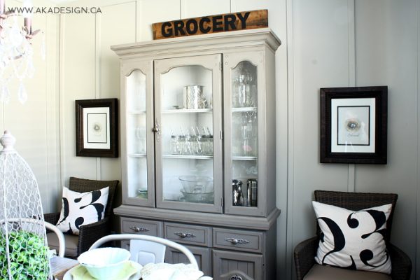 Love this dining room - the gray hutch and the cute numbered pillows kellyelko.com