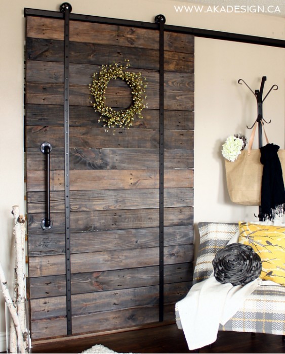 Make a DIY barn wood rolling door with pallets kellyelko.com