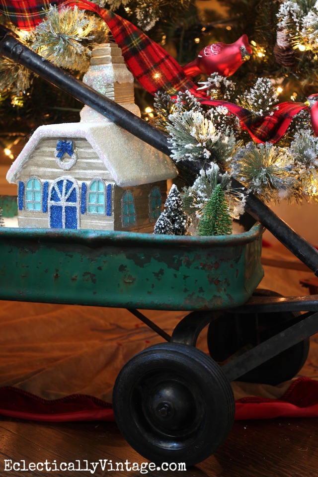 A vintage wagon holds the cutest Christmas snow village - see how to make your own that lights up kellyelko.com