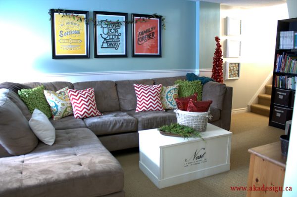 Colorful family room - love the sectional with the different patterned pillows kellyelko.com