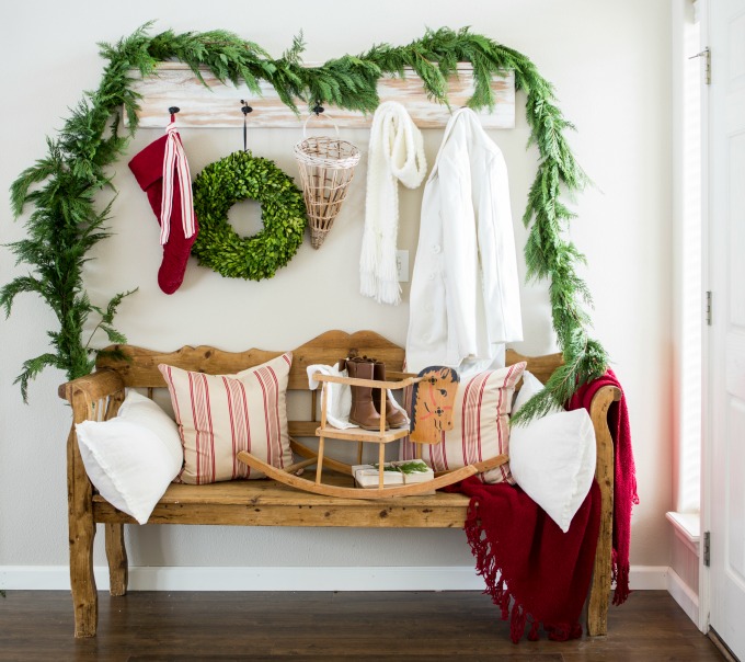 Festive Christmas entryway - love the fresh garland eclectiallyvintage.com