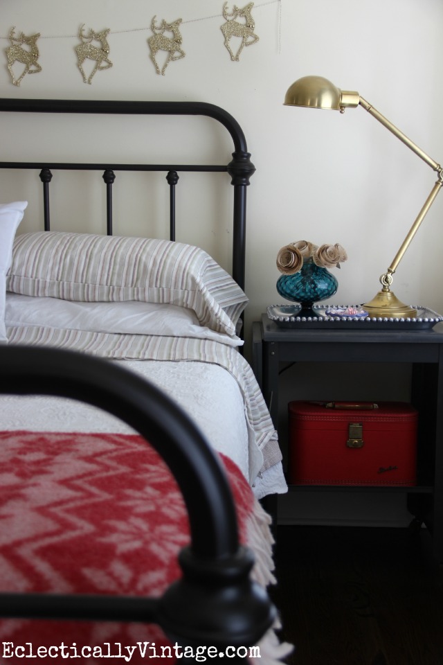 Love the brass pharmacy style lamp and the vintage typewriter table as a nightstand kellyelko.com