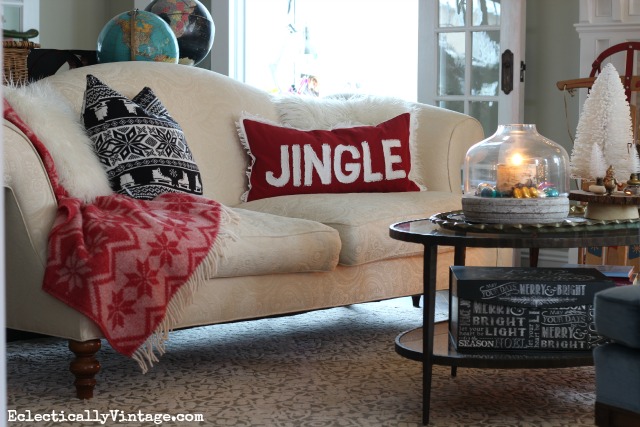 Cozy Christmas decorating - love the fun pillows and throw kellyelko.com