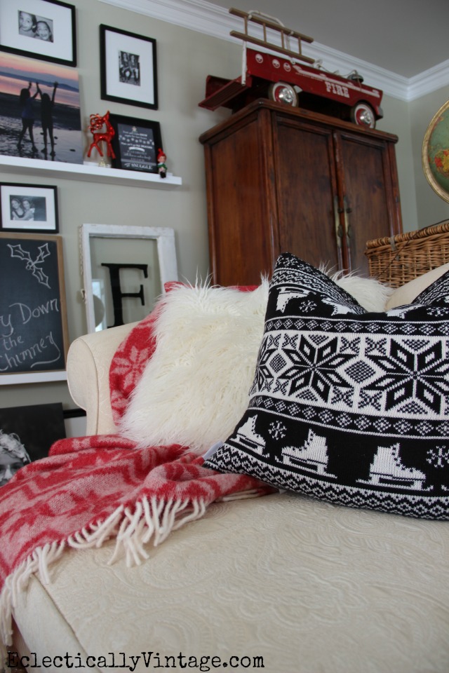 Cozy Christmas living room - love the black and white pillow and that adorable fire truck! kellyelko.com