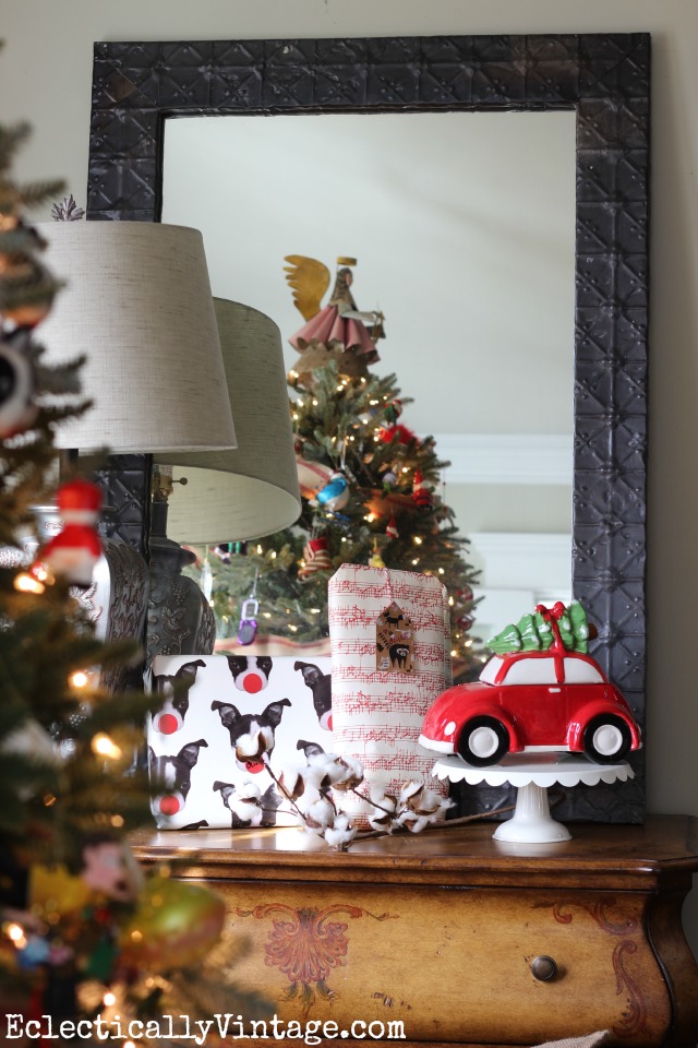 Love this festive family Christmas tree - and the angel tree topper! kellyelko.com