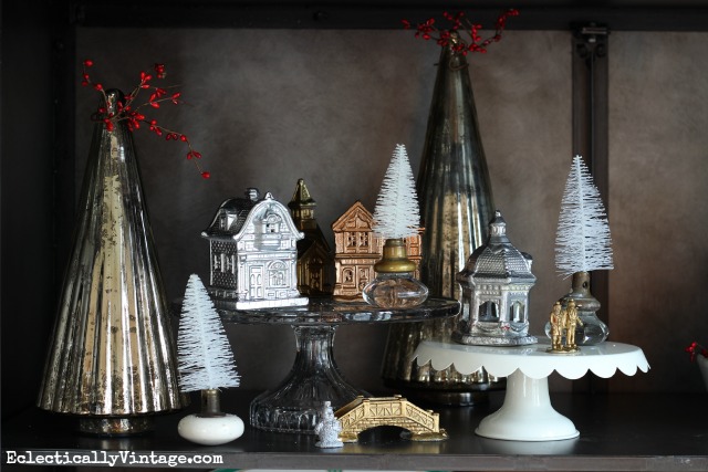 Cute Christmas village display - love the mercury glass trees kellyelko.com