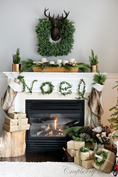 Make a Noel Boxwood sign - what a stunning Christmas mantel kellyelko.com