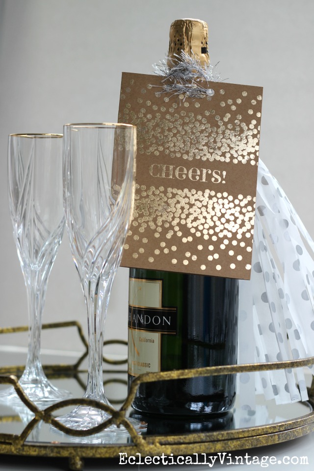 Love this DIY Gold Foil card used on a bottle of bubbly - the perfect hostess gift kellyelko.com