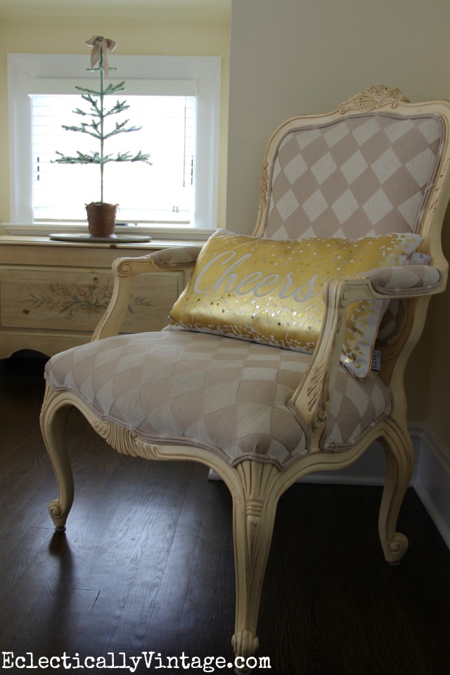 Love this little bedroom nook and the harlequin pattern chair (and Cheers pillow)! kellyelko.com