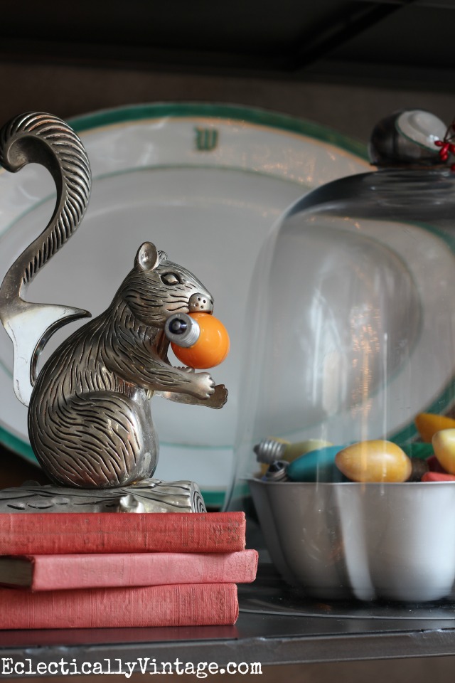 Vintage squirrel nutcracker takes a bite out of old Christmas bulb! kellyelko.com