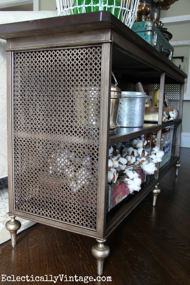 Love the open fretwork of this console table - and all the open shelves for display kellyelko.com