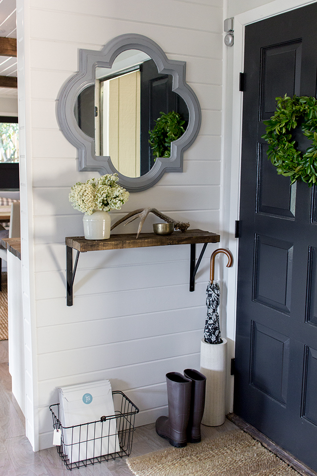 Gorgeous small entry decor ideas - love the mirror and wall shelf kellyelko.com