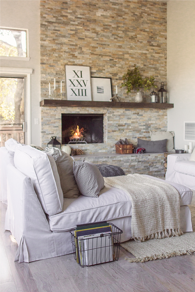 Stunning floor to ceiling tile fireplace wall - this home is gorgeous! kellyelko.com