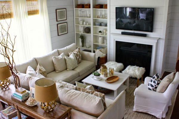 Great furniture layout - love the sectional sofa and the console table with the two little ottomans kellyelko.com