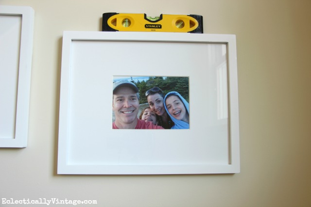 Tips on hanging photos and gallery walls kellyelko.com #DamageFreeDIY