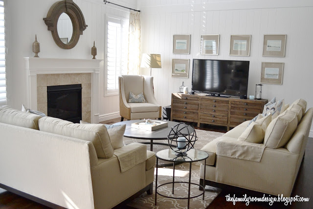 Cozy neutral family room - love the gallery wall around the tv kellyelko.com