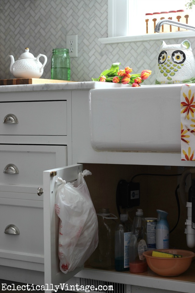 Get those plastic bags organized under the kitchen sink kellyelko.com #DamageFreeDIY