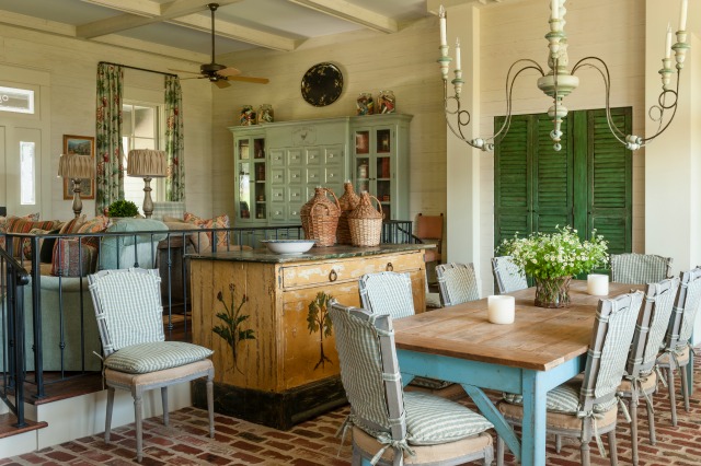 Charming home filled with antiques that make it warm and inviting - love the farmhouse table and brick floor kellyelko.com