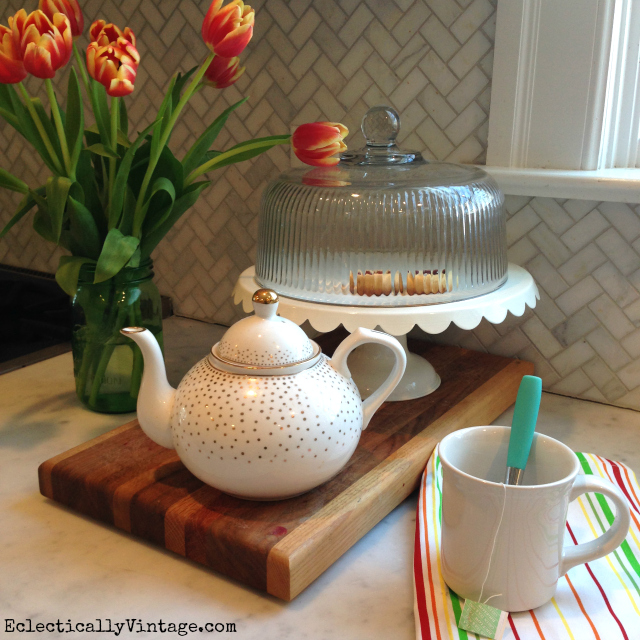 Tulips brighten up any space - love the gold teapot kellyelko.com