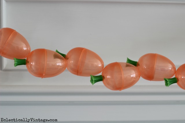 Make a DIY carrot garland - you have to see how cute this spring mantel looks kellyelko.com