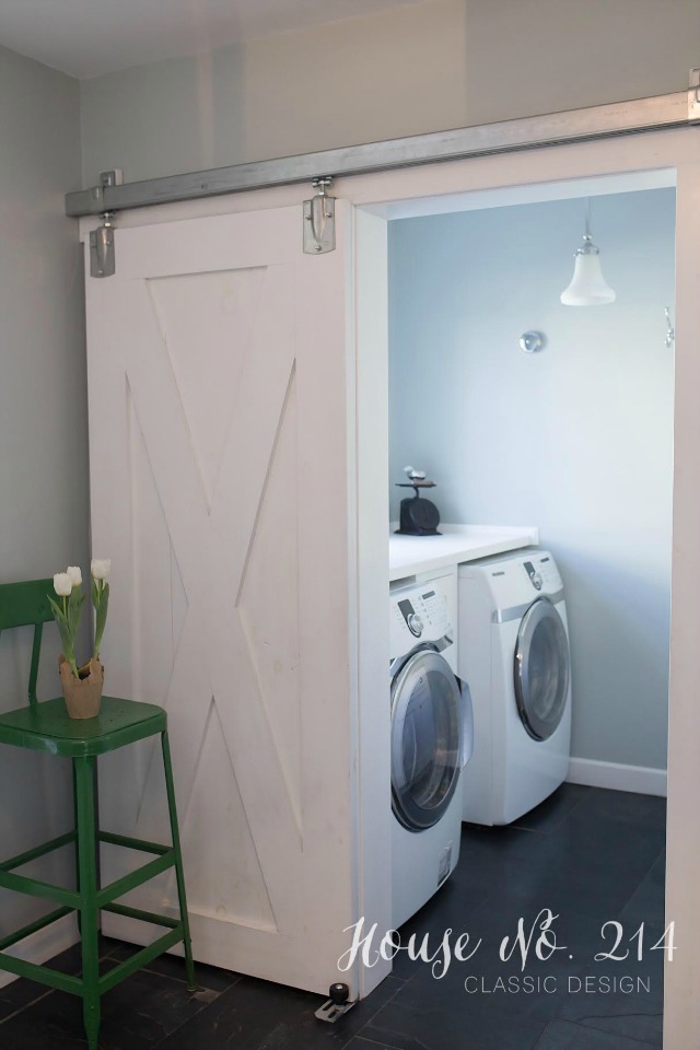 DIY Rolling Barn Door in the laundry room kellyelko.com