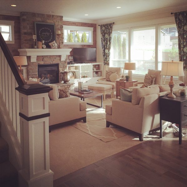 Beautiful family room with stone fireplace and neutral shades kellyelko.com