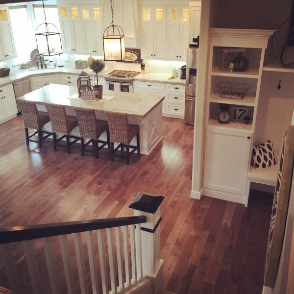 Love the flow of this house with the open white kitchen and large island kellyelko.com