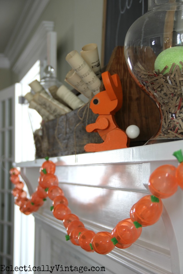 How ridiculously cute is this spring mantel and carrot garland?  See how to make your own kellyelko.com