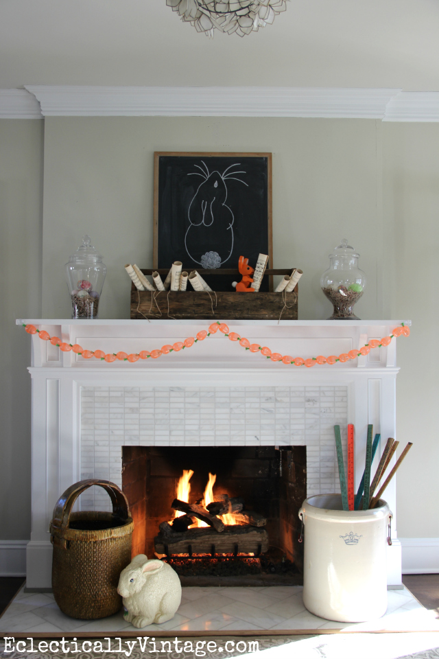 Love this fun spring mantel - see how she used the exact same pieces from winter with just a few minor changes kellyelko.com