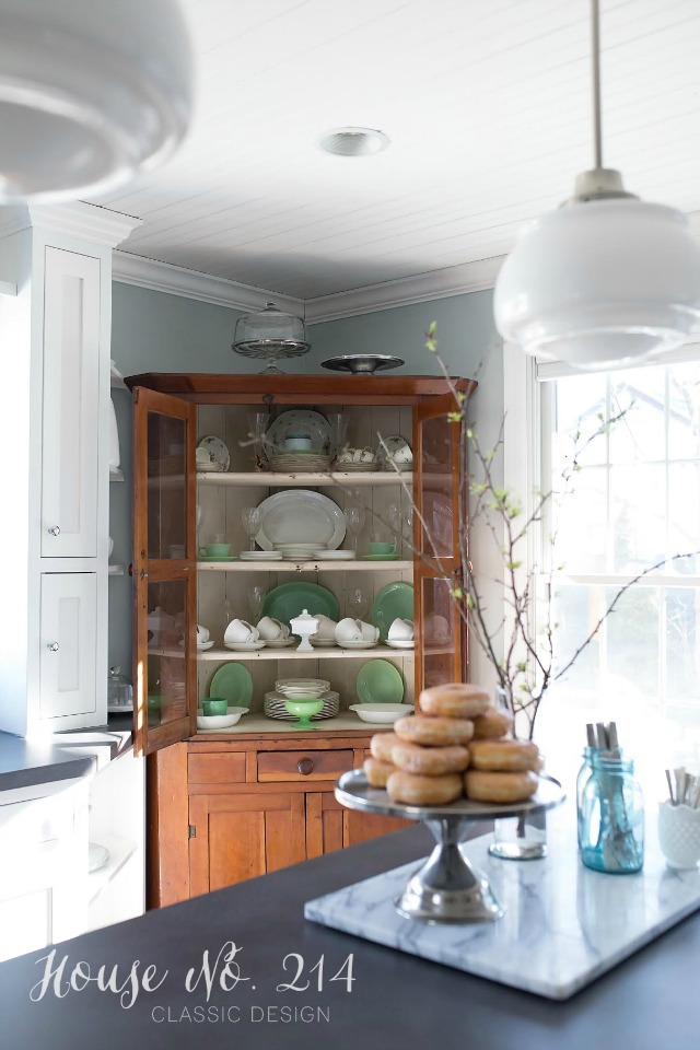 A wood hutch looks amazing in a white kitchen - perfect for displaying collections kellyelko.com