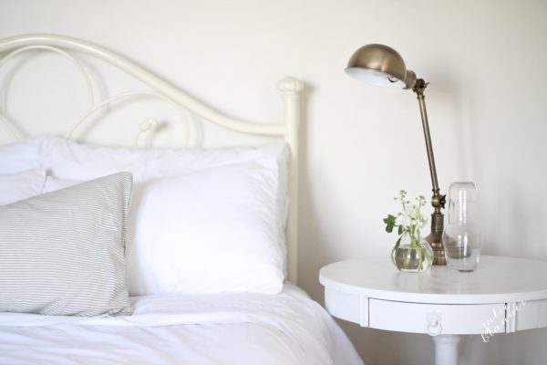 Love the brass pharmacy lamp in this guest bedroom kellyelko.com