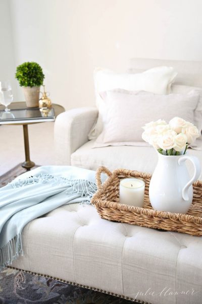 Love this neutral living room and the texture from the throw and basket kellyelko.com