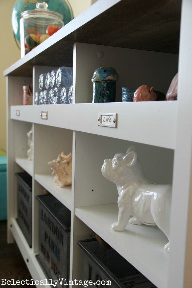 Love this storage console - the cubbies are perfect for display kellyelko.com