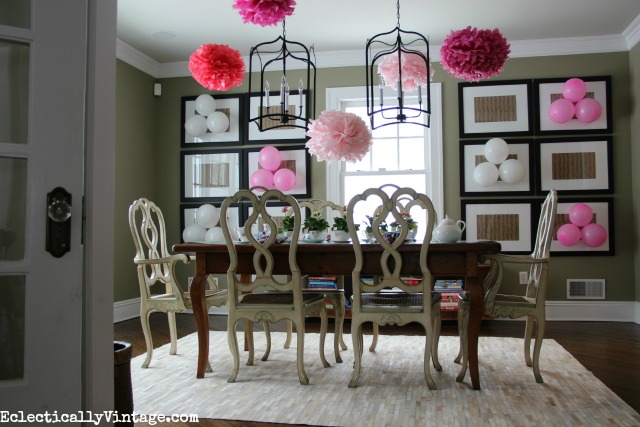 Fun mother's day tea party ideas to wow your guests! Love the pink pom pom flowers! kellyelko.com