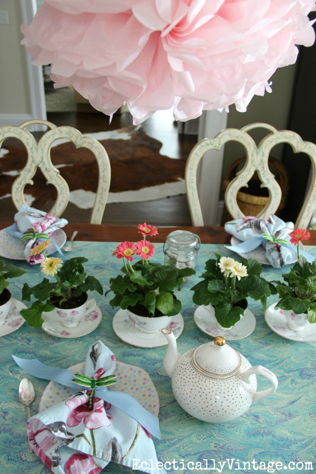 See how to set a fun spring table - this dining room was transformed for a festive tea party kellyelko.com