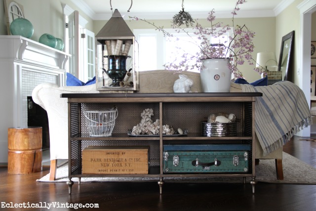 I love this Norton sofa table - it's vintage inspired and it has tons of storage space for showing off favorite things kellyelko.com