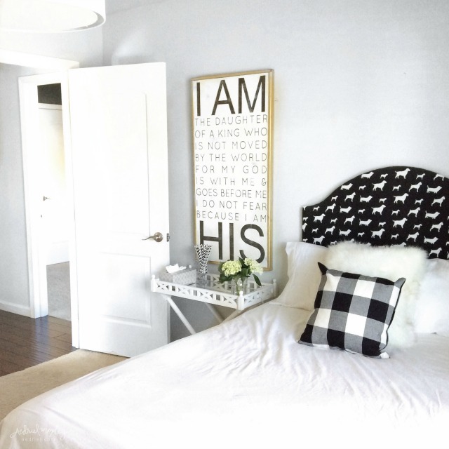 Cute black and white bedroom - love dog fabric headboard and the hand lettered sign kellyelko.com