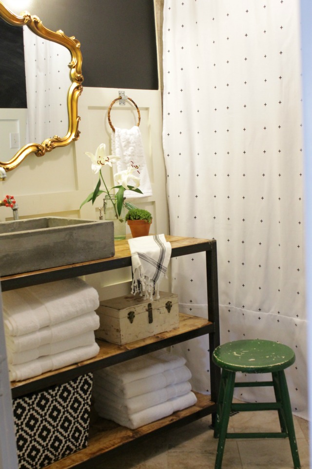 Love this open shelf bathroom vanity and concrete sink kellyelko.com