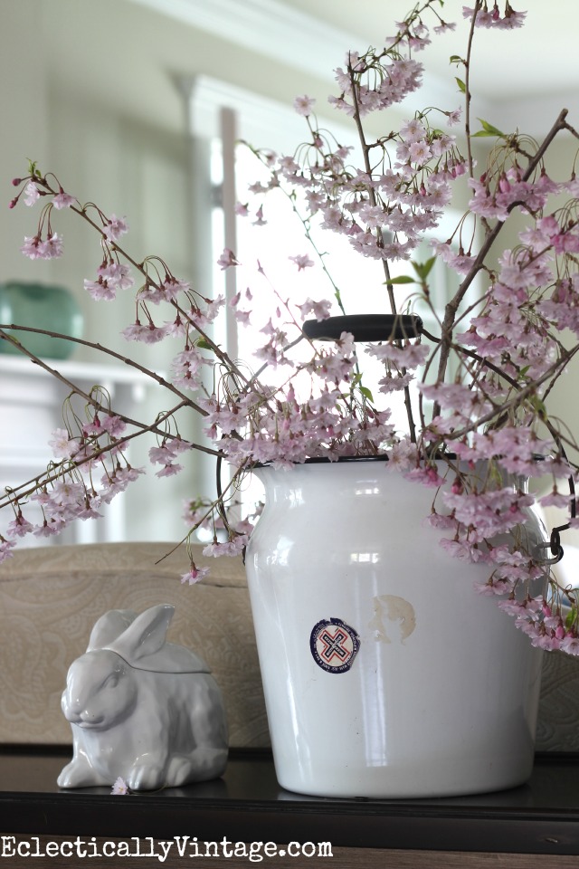 Fill a vintage bucket with fresh cut spring flowers for a beautiful display kellyelko.com