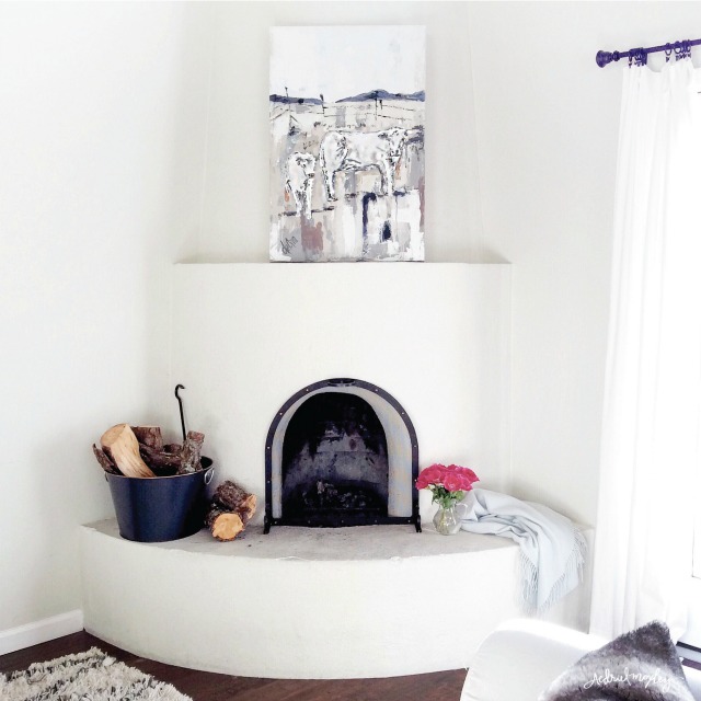 Love this white adobe fireplace kellyelko.com