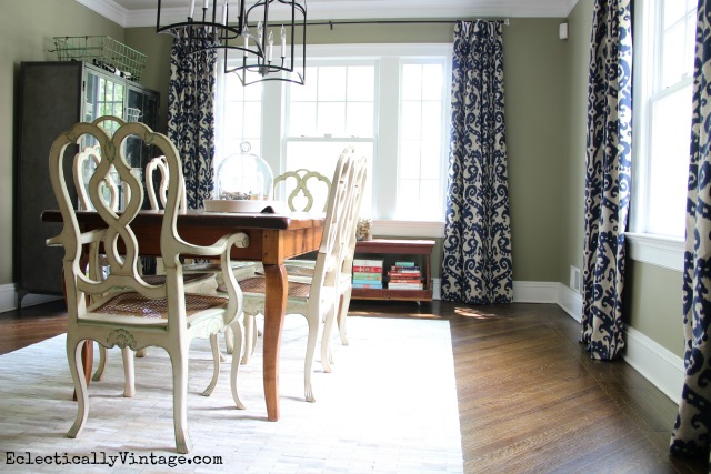 Love the drama that these curtains add to this eclectic dining room kellyelko.com