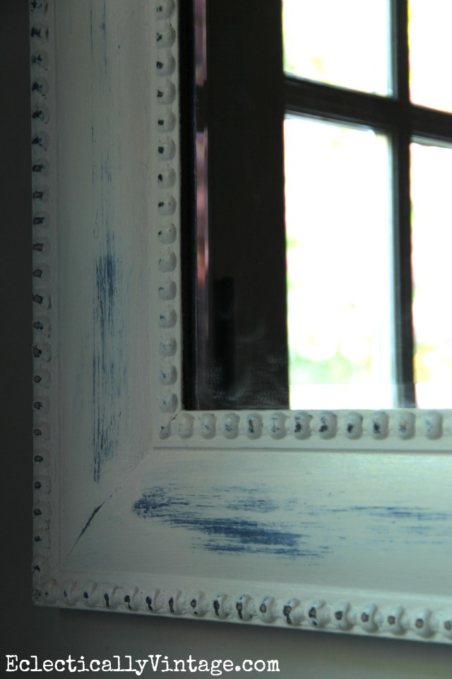 DIY chalk paint mirror - love the blue peeking out from beneath the white kellyelko.com
