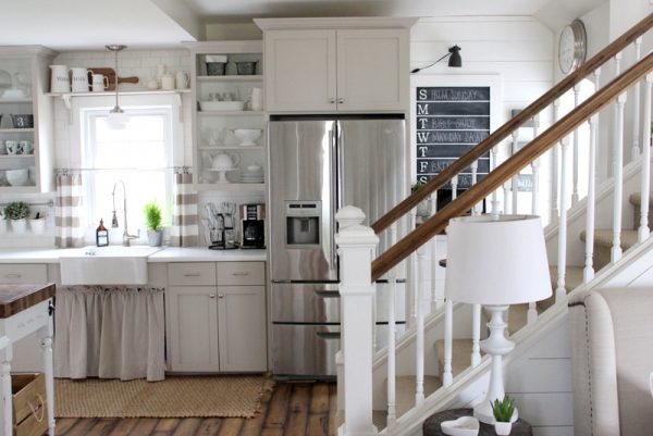 Country kitchen done on a tight budget - love the gray open cabinets and chalkboard command center kellyelko.com